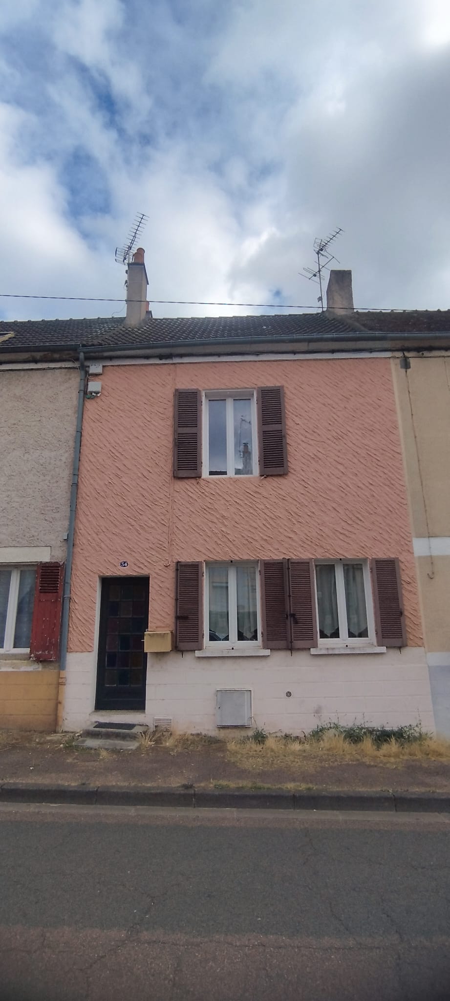 Maison de ville de ville F3 avec terrain